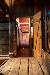 old wooden house interior. Corridor between rooms
