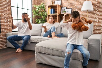 Fototapeta premium Family sitting on sofa and kid sad for partents argue at home