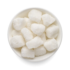 Fototapeta na wymiar Rough sugar cubes in round bowl isolated on white. Top view.