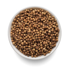 Dry coriander seeds in round bowl isolated on white. Top view.
