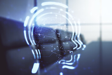 Abstract virtual artificial Intelligence interface with human head hologram on a modern conference room background. Multiexposure