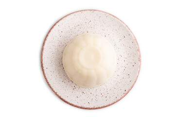 White milk jelly on white, top view.
