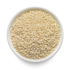Sesame seeds in round bowl isolated on white. Top view.