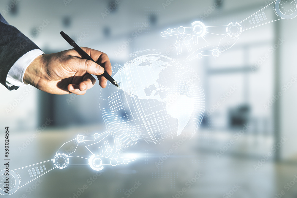 Poster male hand with pen draws abstract virtual robotics technology sketch with globe on blurred office ba
