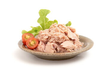 Tuna in spring water isolated on white background.