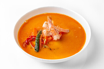 Fragrant first course seafood in fish back and shrimp shell broth. Vegetarian dietary cream soup based on baked and fresh vegetables. Fitness menu. Delivery of prepared food. White background