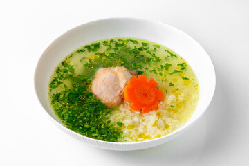 Fragrant first course from chicken broth, rice and poultry meat with herbs. Dietary cream soup based on baked and fresh vegetables with herbs. Fitness menu. Delivery of prepared food. 