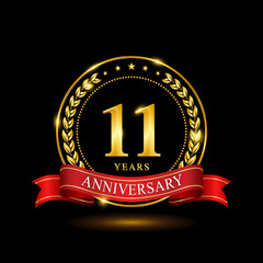 11 Years Anniversary template design, with shiny ring and red ribbon, laurel wreath isolated on black background, logo vector