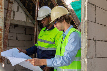 Engineers inspect the building as a shop that meets the designer's requirements.