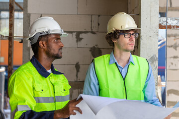 Engineers inspect the building as a shop that meets the designer's requirements.