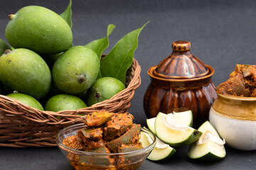 Mango Pickle Also Called Aam Ka Achar, Sookha Kairi, Chatpata Loncha Is Made of Unpeeled Raw Green Mango Cut Mixed With Spices - Garlic, Masala, Red Chilli, Salt, Turmeric, Sarson, Mustard, Sarso Oil