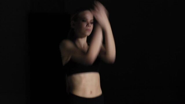 Energetic Young Woman Choreographer Dancing Alone in Studio