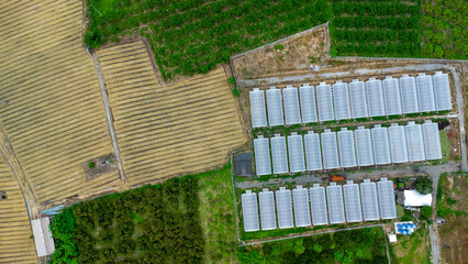 Aerial view of an environmentally friendly building or factory consisting of solar panels or...