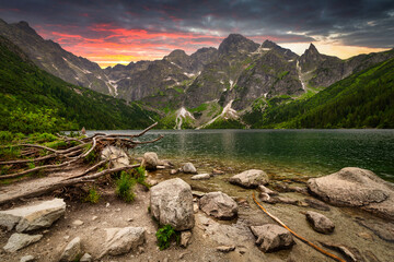 Amazing sunset in the Tatra Mountains above Eye of the Sea Lake, Poland - obrazy, fototapety, plakaty