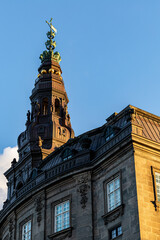 Obraz premium Copenhagen, Denmark The spire of the Christiansborg Palace or Castle, and the Danish Parliament.