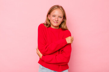 Fototapeta premium Caucasian teen girl isolated on pink background massaging elbow, suffering after a bad movement.
