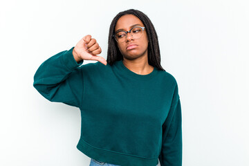 Young African American woman isolated on white background showing a dislike gesture, thumbs down....