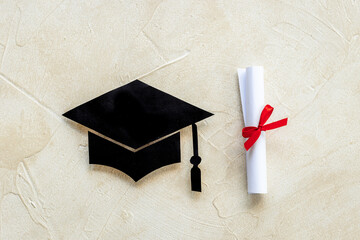 Education concept. Graduation hat or academic cap paper cut with diploma