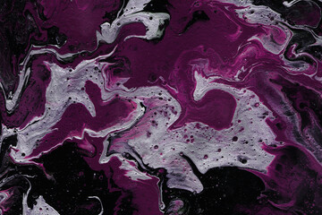 Acrylic texture made in fluid pour technique.  Background in magenta, silver and black colors.