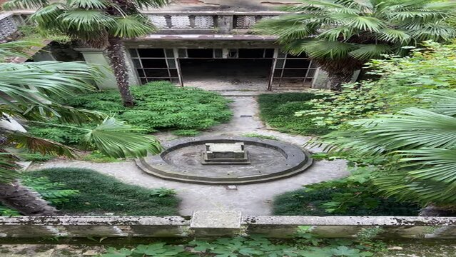 abandoned fountain in garden