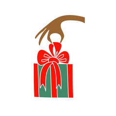 A Christmas present. The hand holds a gift box with a red bow close up. The concept of international grant exchange is a Christmas holiday, a hand gives a New Year s box