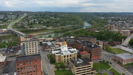 The Marion County courthouse in Fairmont, WV, and the surrounding small town river and countryside in the appalachian mountains.