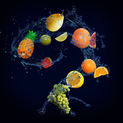 Obraz na płótnie Canvas Wallpaper with fruits in water - juicy pineapple, grapes, orange, grapefruit, strawberry, lime are full of vitamins