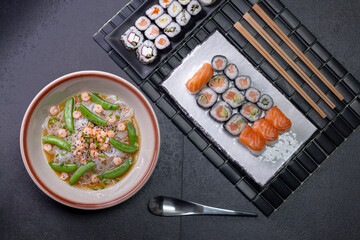 Various dishes of Asian cuisine with typical sushi