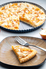 still life of fruit cake with almonds