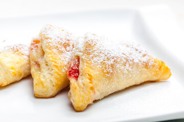 homemade puff pastry filled with strawberry jam