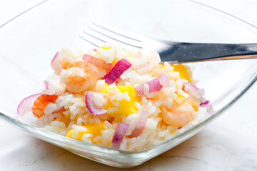 rice salad with shrimps, red onion and yellow pepper