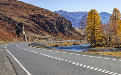 Road in the mountains of Altai, autumn view