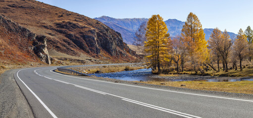 Road in the mountains of Altai, autumn view