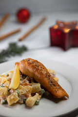Traditional Christmas dinner in Czech Republic - salmon fillet with potato salad