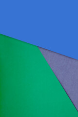 Dark and light, Plain and Textured Shades of blue purple green papers background lines intersecting to form a triangle shape