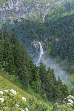 Typical alpine landscape with waterfalls (Niemerstafelbachfall), Swiss Alps near Klausenstrasse, Spiringen, Canton of Uri, Switzerland