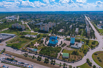 Spaso-Preobrazhensky Cathedral against the blue sky. Ukraine, Krivoy Rog. Aerial view from a drone. Urban landscape. City center panorama
