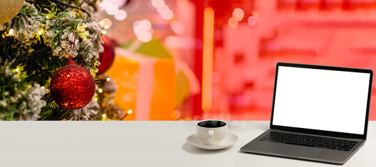 laptop screen black and white on the table has a coffee cup and tree Christmas, nobody, copy space