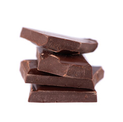 Chocolate pieces stack isolated on white background. Dark chocolate. Close up.