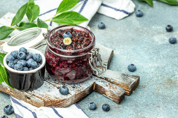 blueberry jam in a jar. Homemade food concept. place for text, top view