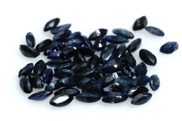 Natural gemstone blue sapphire isolated on white background