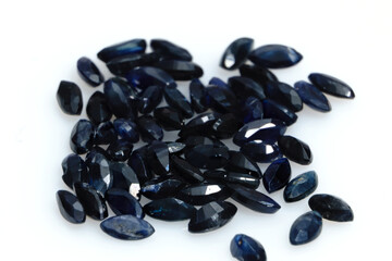 Natural gemstone blue sapphire isolated on white background
