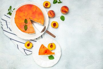 dessert peaches, cheesecake with peache jelly on white plate. Restaurant menu, dieting, cookbook...