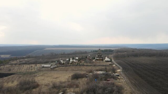 Svyatogorsk, Ukraine. Wooden All Saints skete, a part of the Svyatogorsk Lavra in Ukraine, on cloudy day
