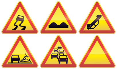 Collection of black, red and yellow triangular warning signs of various temporary road hazards, such as slippery road, gravel spray, traffic jam, speed bump and road accident