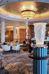Elegant Art Deco interior design furnishing bar lounge area onboard ocean liner cruiseship cruise...