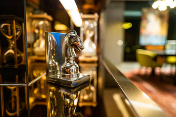 Fototapeta na wymiar Golden horse head figuring in a luxury room