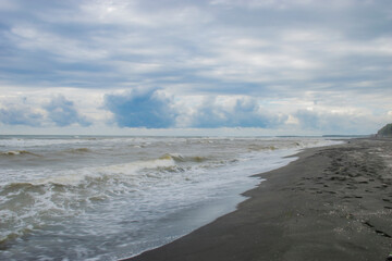 little waves on the  pacific ocean beach
