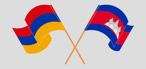 Crossed and waving flags of Armenia and Cambodia