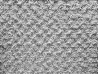 Naklejka premium Texture, background of white soft plush fabric. Top view, close-up. 